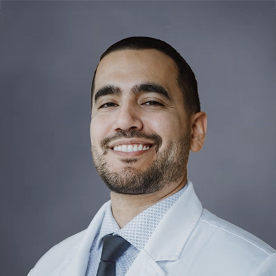 A headshot of Dr. Jorge Ayala, a chiropractor at Vertex Chiropractic.